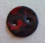 Bouton_rond_rouge_et_noir