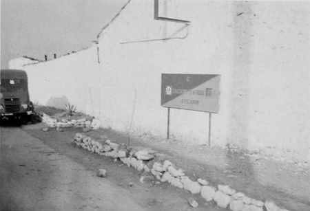 12_RCA_BRETONNEAU_3_Entr_e_camp_Guendouza_rue_principale