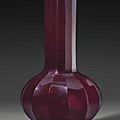 A red glass faceted bottle vase, China, Qing dynasty, 18th century