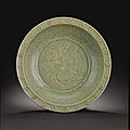 A very rare large carved Longquan celadon dish, Yuan dynasty, early 14th century