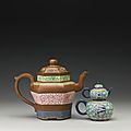 Two yixing famille-rose enameled teapots and covers, qing dynasty, 19th century