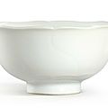 A fine white glazed 'mallow' cup, mark and period of yongzheng (1723-1735)
