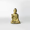 An important small gilt-bronze seated figure of buddha, korea, unified silla period, 8th century