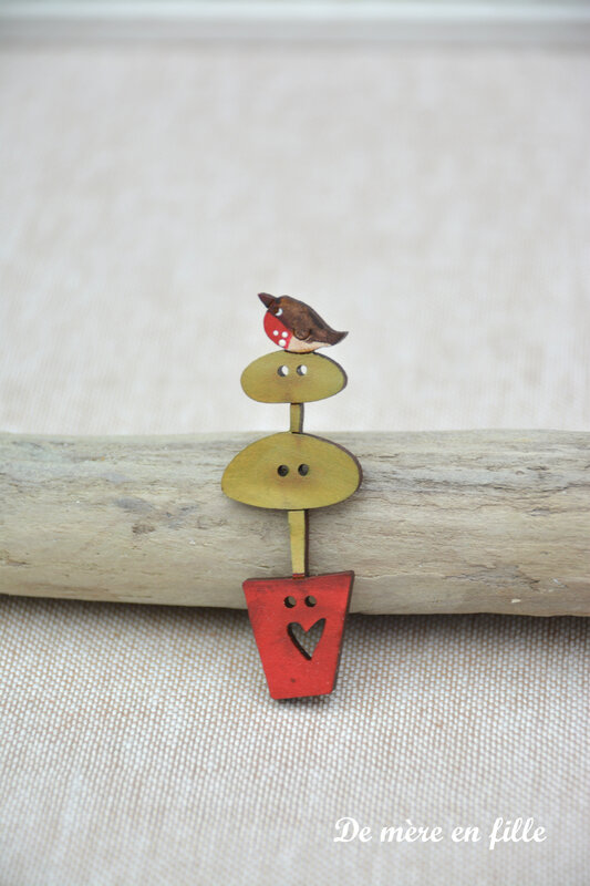 Rouge gorge sur les buis