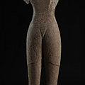 A sandstone torso of a male deity, cambodia, baphuon style, 11th century