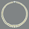 An exceptional two-strand natural pearl and diamond necklace