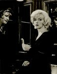 film_slih_scene_train_black_dress_bourbon_1_1