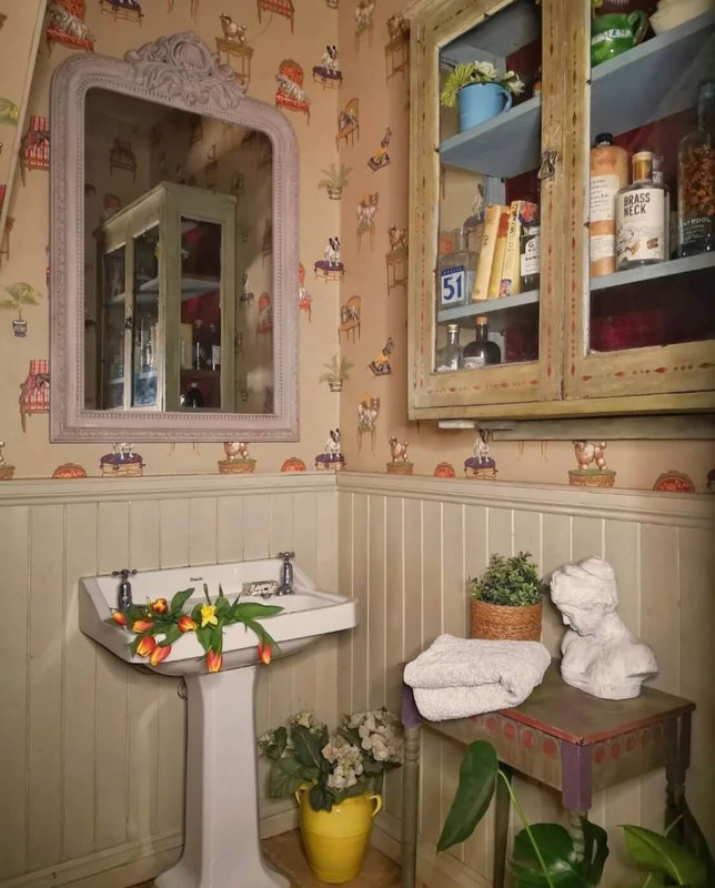 powder-room-dog-wallpaper-vintage-medicine-cabinet-nordroon