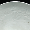 A fine large early Ming anhua-decorated white-glazed bowl, lianziwan, Yongle period (1403-1425)