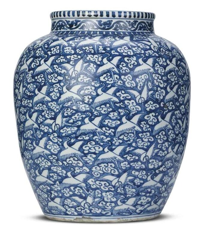 A reserve-decorated blue and white 'Hundred Cranes' jar, Wanli six-character mark within double circles and of the period (1573-1619) 2