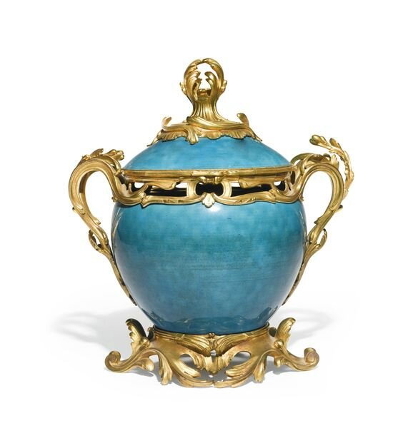 A late Louis XV gilt-bronze mounted Sèvres green porcelain pot