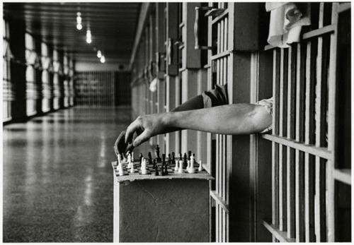 Inmates playing chess from prison