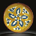 A rare amber, cream and blue-glazed shallow dish, Tang dynasty (618-907) 