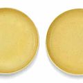 A pair of yellow-glazed saucer-dishes, guangxu six-character marks and of the period (1875-1908)