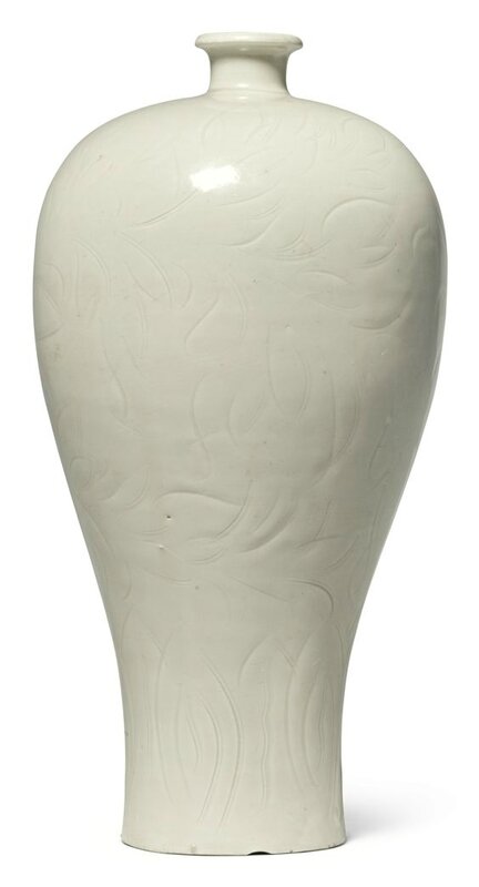An exceptional and extremely rare “Ding” carved “peony” vase, Northern Song dynasty