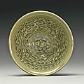 A 'Yaozhou' Celadon Molded 'Fish' Bowl, Jin Dynasty
