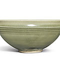 A large 'yaozhou' carved 'wave' deep bowl, jin dynasty (1115-1234)