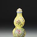 An imperial enamelled glass double-gourd 'peony and magnolia' snuff bottle, palace workshops, blue-enamel mark and period of qia