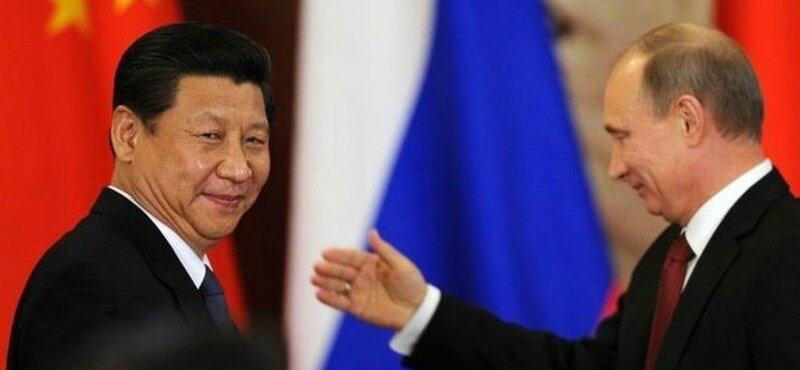 575125_les-presidents-chinois-xi-jinping-et-russe-vladimir-poutine-a-moscou-le-22-mars-2013-1728x800_c