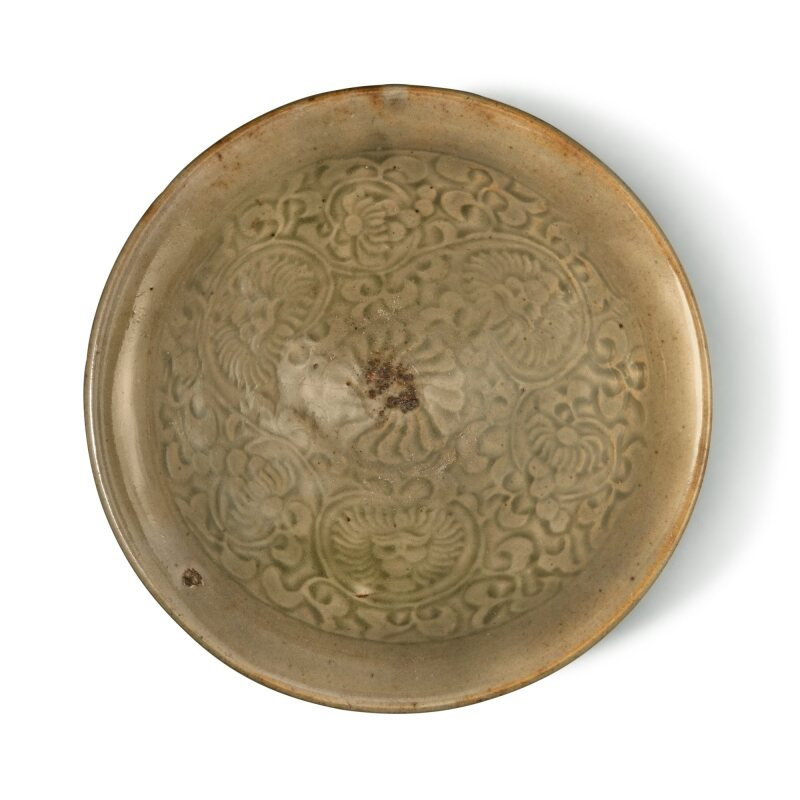 A molded 'Yaozhou' celadon-glazed 'floral' bowl, Northern Song dynasty