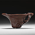 An archaistic carved rhinoceros horn libation cup, Qing dynasty, 17th/18th century