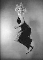 1959-10-NY-Jump_sitting-black_dress-by_halsman-013-1b