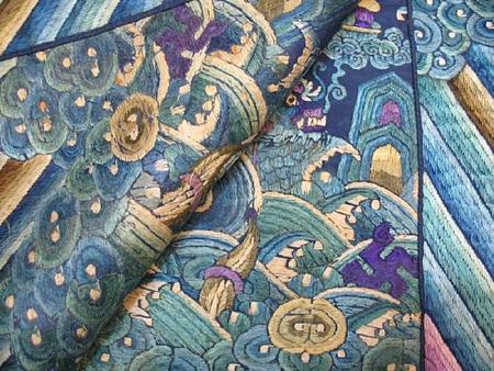 A_fine_blue_silk_ground_embroidered_dragon_robe7