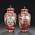 A pair of red overlay glass covered jars. 19th Century. Photo Bonhams