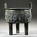 A fine archaic bronze ritual food vessel, liding, Late Shang dynasty (c