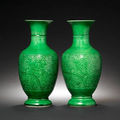 A pair of green-glazed carved baluster vases. early 18th century
