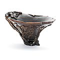 A rhinoceros horn 'prunus' libation cup, 17th-18th century
