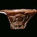 A carved rhinoceros horn cup with dragon, china, qing dynasty, 17th century