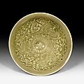 A small celadon glazed Yaozhou bowl with floral spray inside, China, Song dynasty
