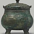 A rare bronze double-owl-form  ritual food vessel (you), late shang dynasty, 13th-11th century bc