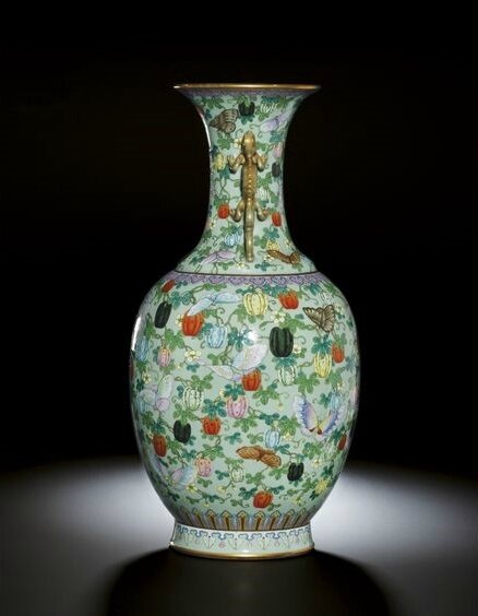 A very rare and finely enamelled 'famille-rose' celadon ground butterfly vase, Seal mark and period of Qianlong (1736-1795)