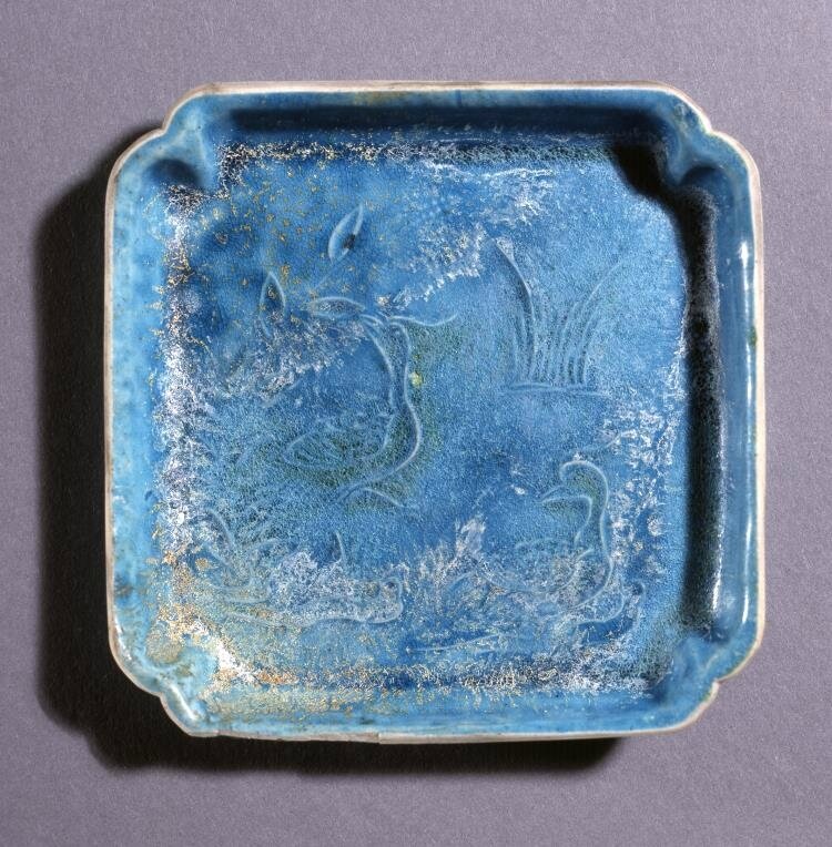 Square porcelain dish with raised slip decoration and monochrome turquoise glaze, Ming dynasty, Jiajing period (1522-1566)