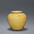 A Xingyao yellow-glazed jar, Tang dynasty (618-907)