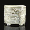  a rare large well-carved pale greenish-white jade brushpot, bitong, qianlong period (1736-1795) 