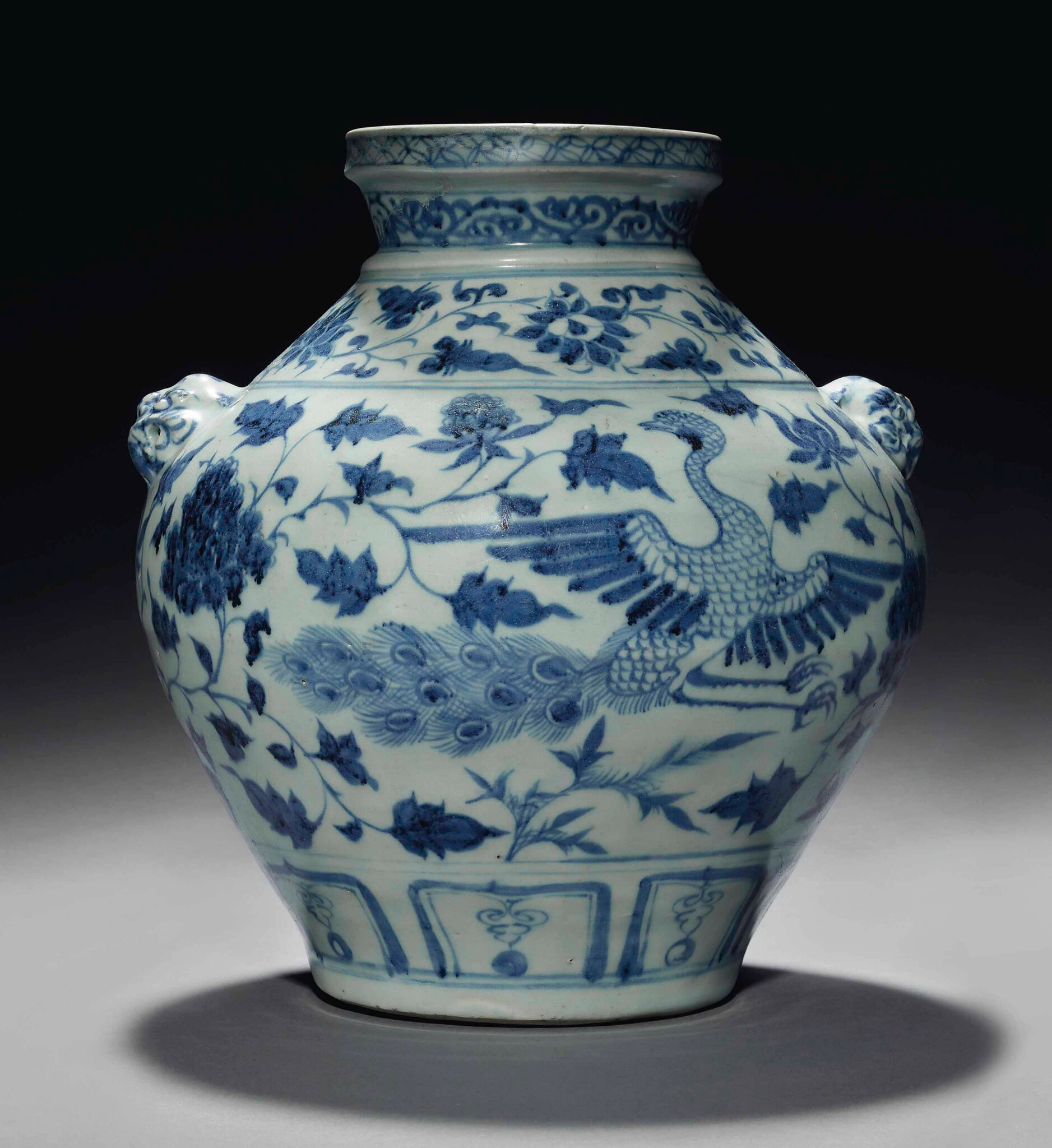 A very rare blue and white 'Peacock' jar, guan, Yuan dynasty (1279-1368)
