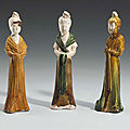 A group of three sancai-glazed pottery female attendants, tang dynasty (618-906)