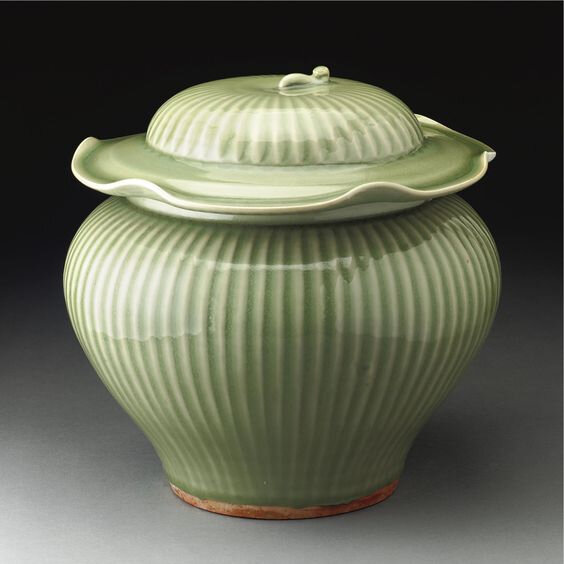 A rare 'Longquan' celadon 'hundred rib' jar and cover, guan, Yuan dynasty