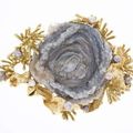 Gilbert albert, broche en or 750 ornée d'une oncolite et de perles
