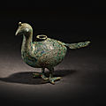 A rare bronze peacock-form vessel, han dynasty (206 bc-ad 220)
