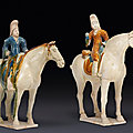 Two rare sancai and blue-glazed pottery figures of equestrians, Tang dynasty (AD 618-907)