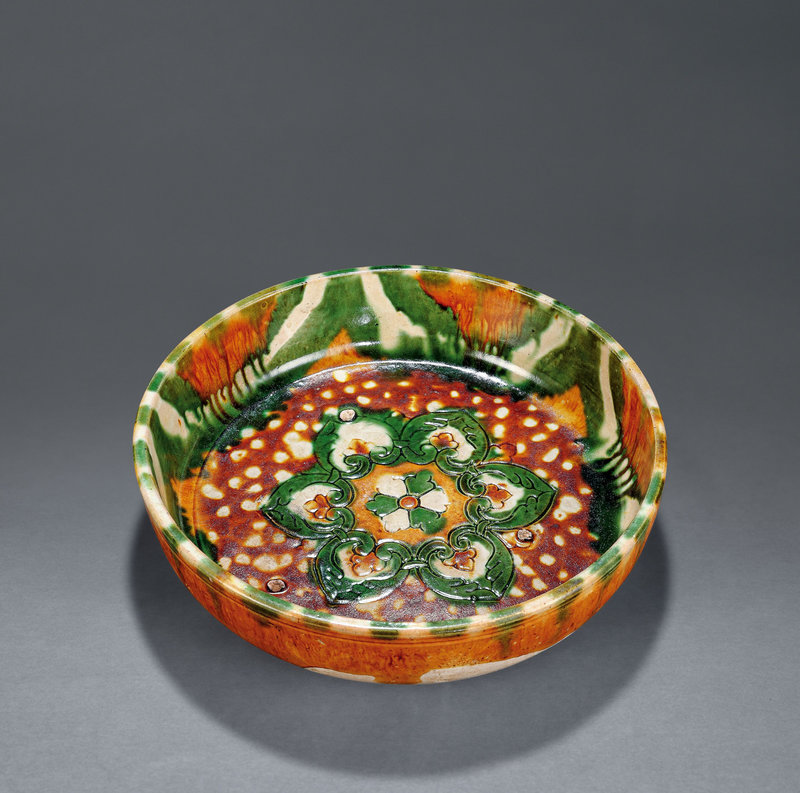 A sancai-glazed 'floral' bowl, Tang dynasty (618-907)
