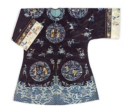 A_woman_s_midnight_blue_silk_overcoat_with_polychrome_figure_embroidery