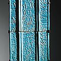 Two monumental turquoise-glazed calligraphic tiles, signed by yusuf ibn ‘ali [ibn] muhammad ibn abi [tahir], probably kashan
