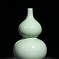 A fine celadon-glazed double-gourd vase, seal mark and period of qianlong (1736-1795)