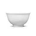 A fine small white-glazed bowl, kangxi mark and of the period (1662-1722)