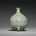 A 'guan'-type, 'Longquan' celadon, waterpot and a stopper, Song Dynasty
